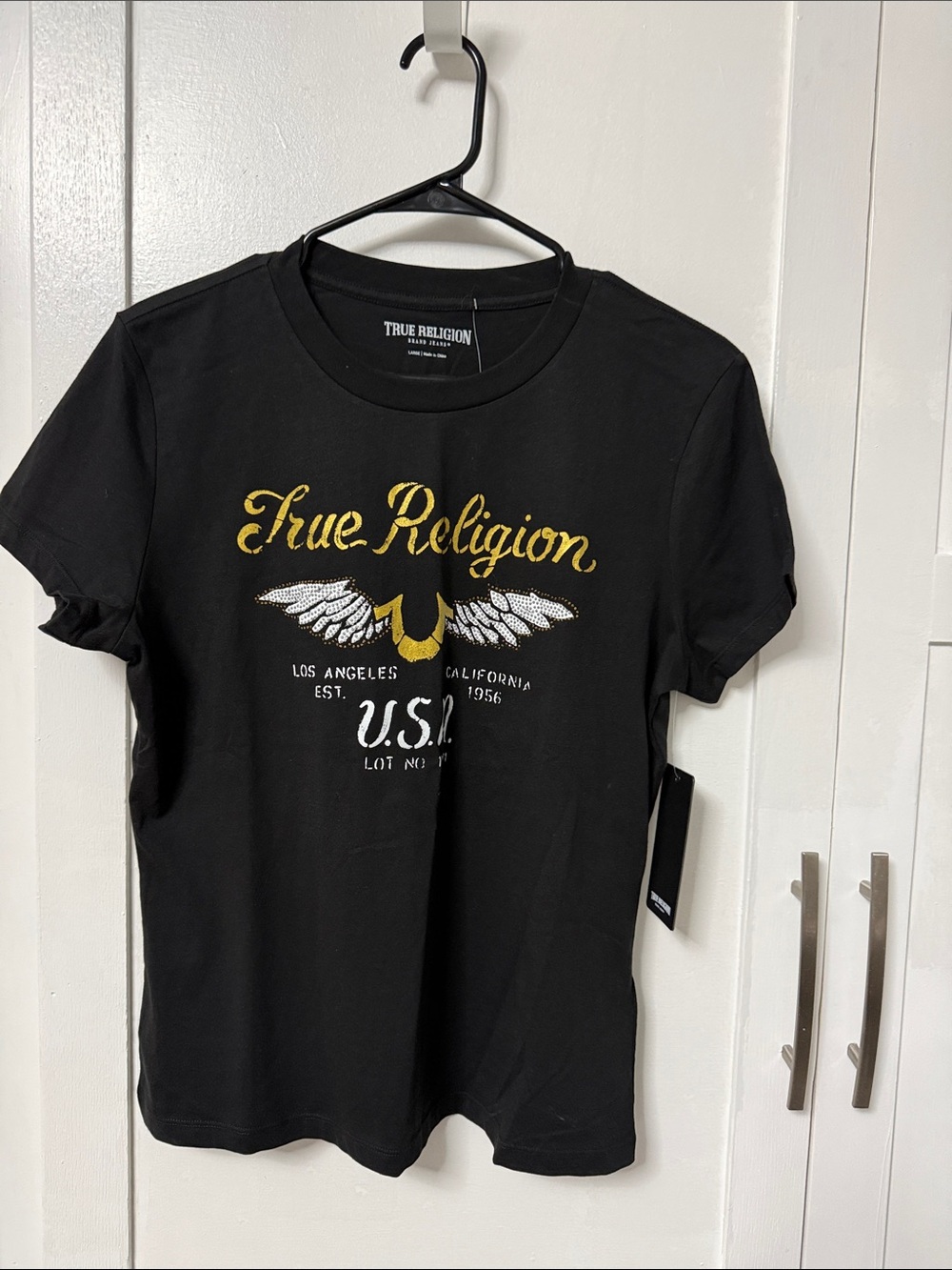 True Religion Black Tee with Gold & White Wing Logo